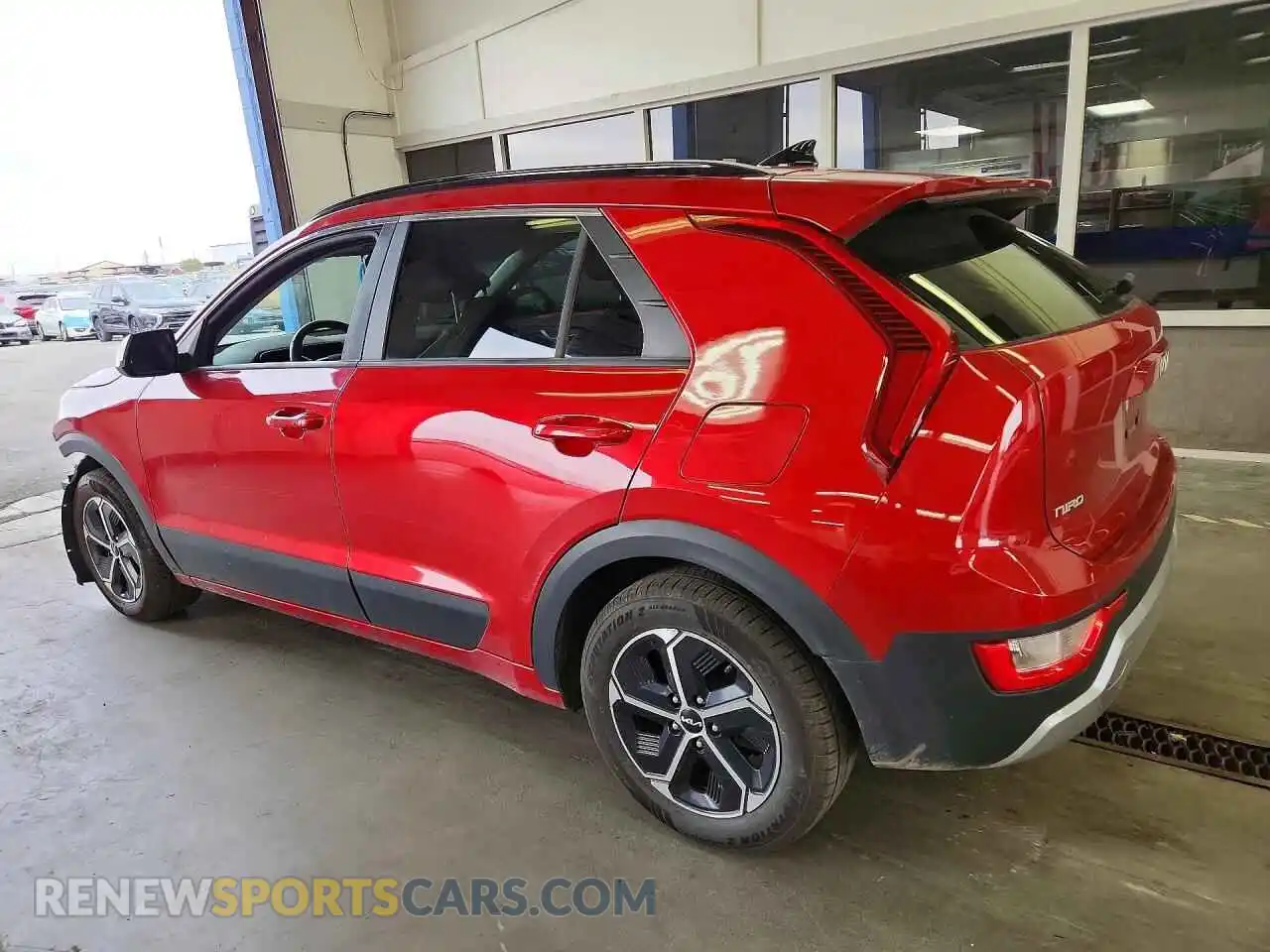 2 Photograph of a damaged car KNDCR3LEXP5063888 KIA NIRO 2023