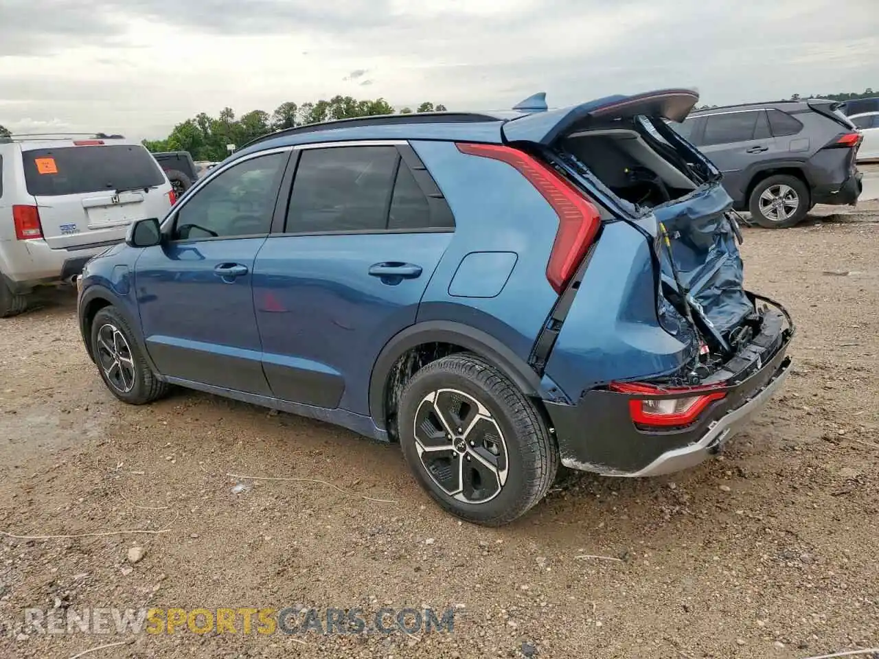 2 Photograph of a damaged car KNDCS3LF0P5054128 KIA NIRO 2023
