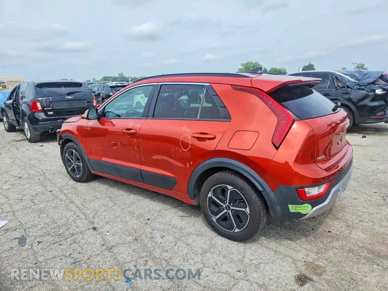2 Photograph of a damaged car KNDCS3LF4P5066444 KIA NIRO 2023
