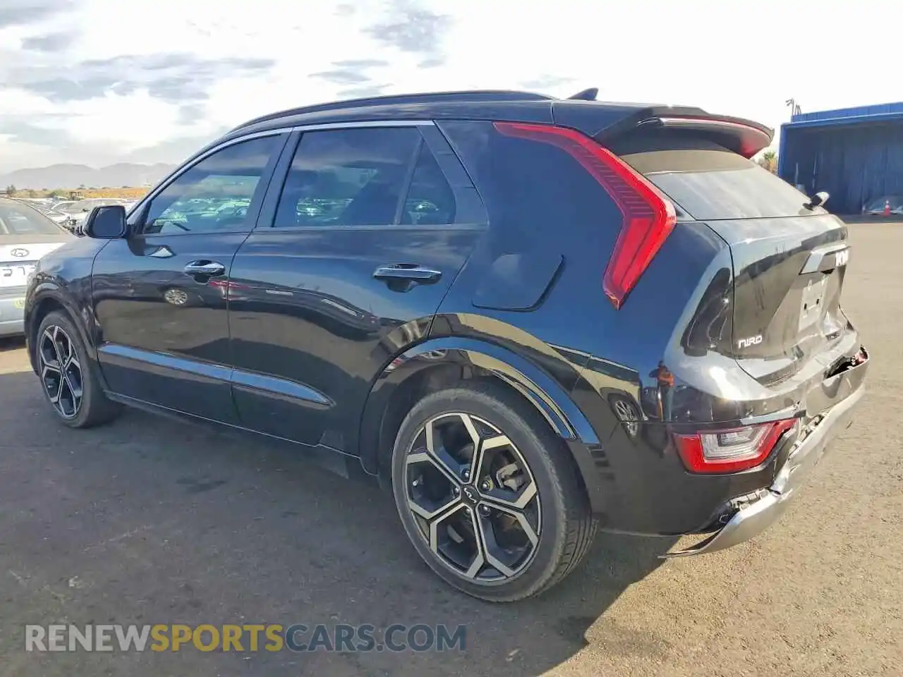 2 Photograph of a damaged car KNDCT3LE6P5038035 KIA NIRO 2023