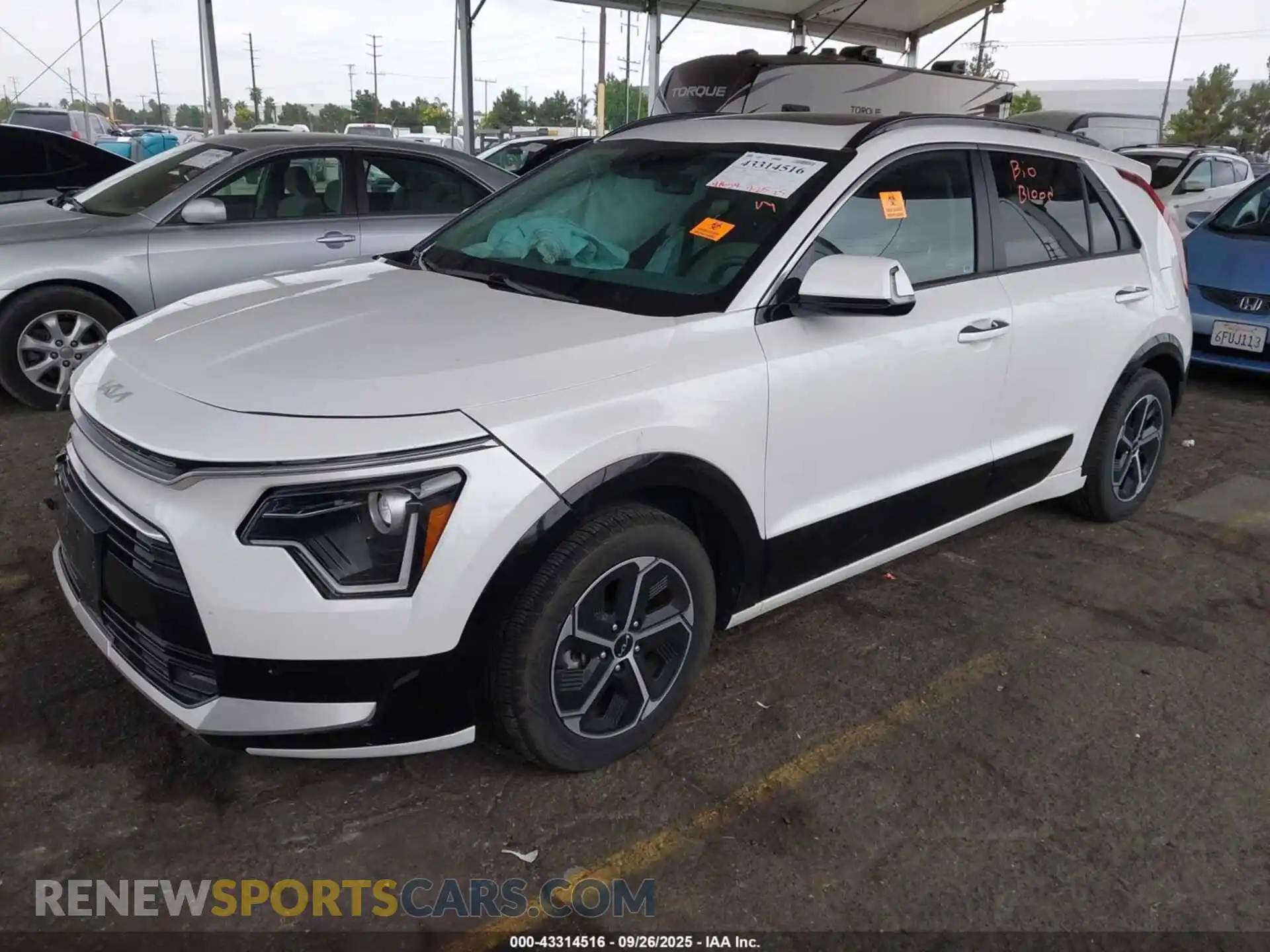 2 Photograph of a damaged car KNDCT3LE7P5074459 KIA NIRO 2023