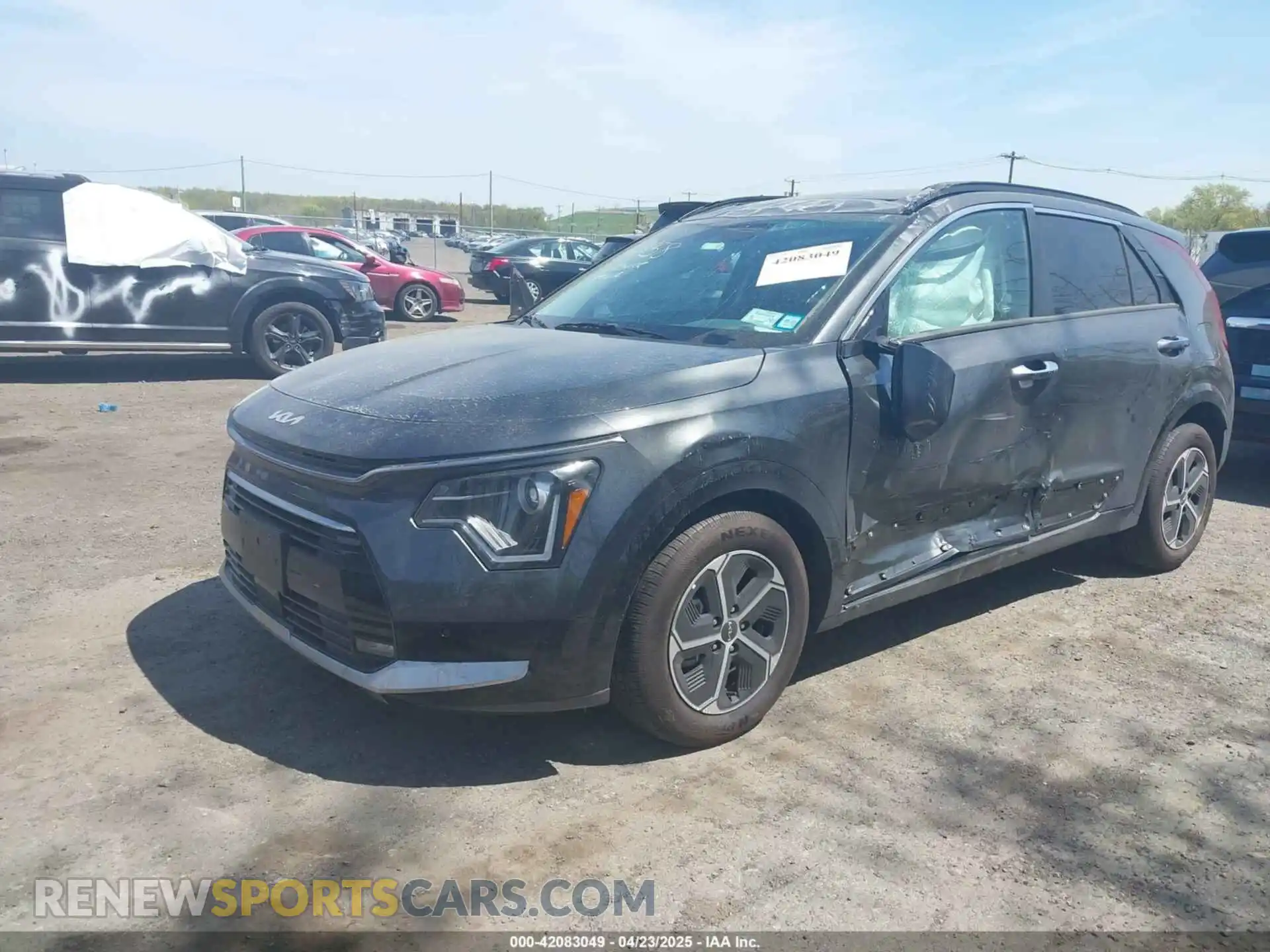 2 Photograph of a damaged car KNDCT3LE7P5086661 KIA NIRO 2023