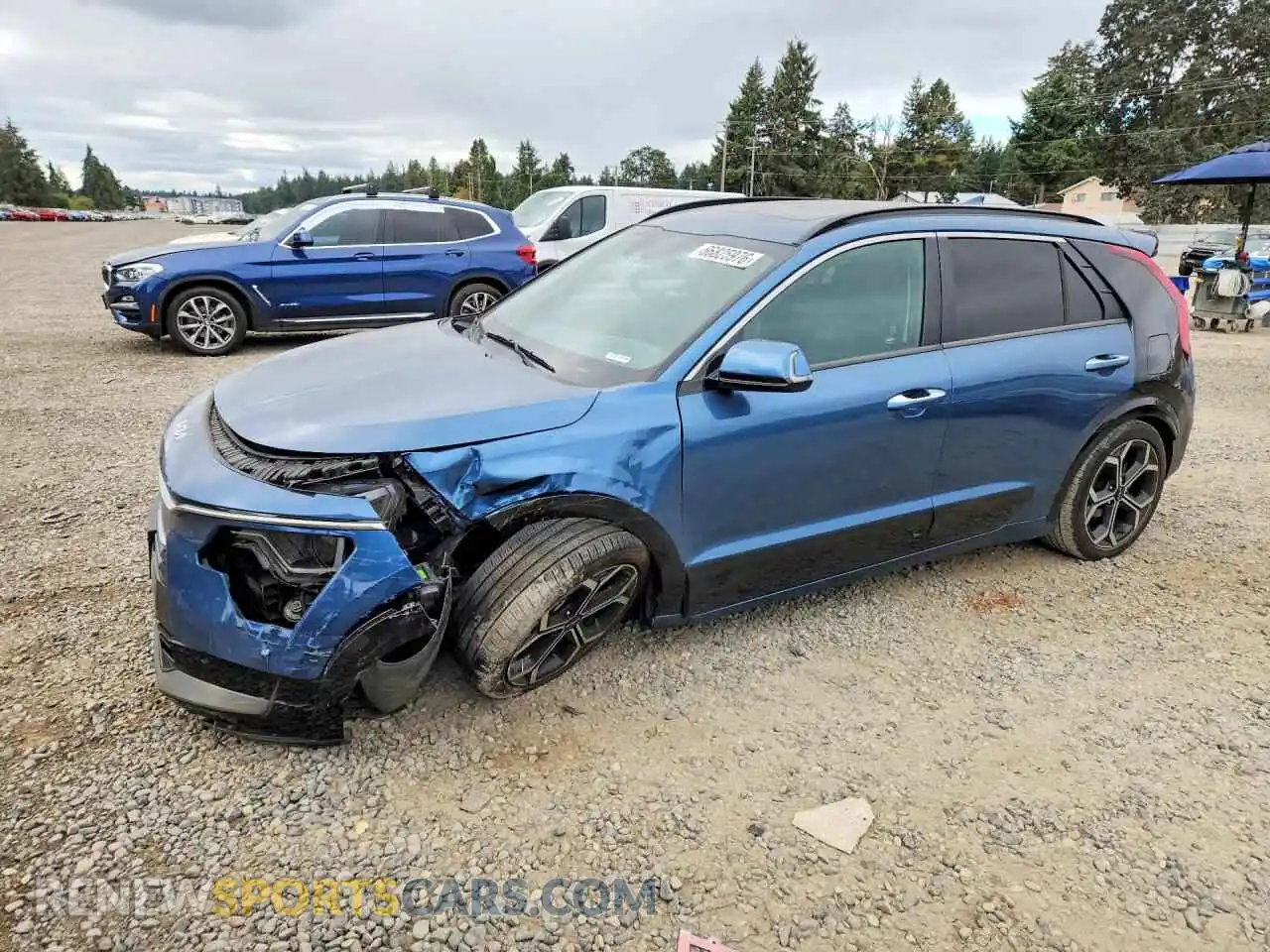 1 Photograph of a damaged car KNDCT3LEXP5037910 KIA NIRO 2023
