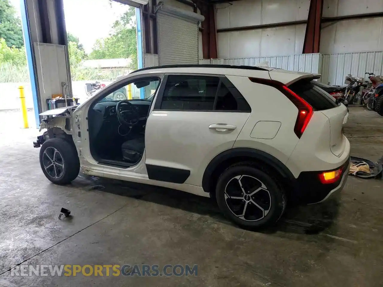 2 Photograph of a damaged car KNDCP3LE0R5183868 KIA NIRO 2024