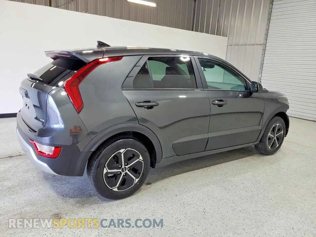 3 Photograph of a damaged car KNDCP3LE0T5335591 KIA NIRO 2026