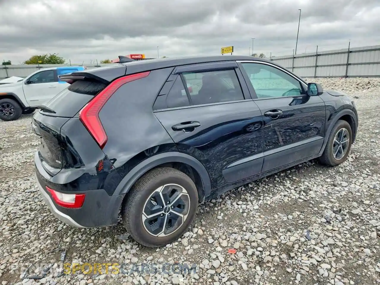 3 Photograph of a damaged car KNDCP3LE0T5348194 KIA NIRO 2026