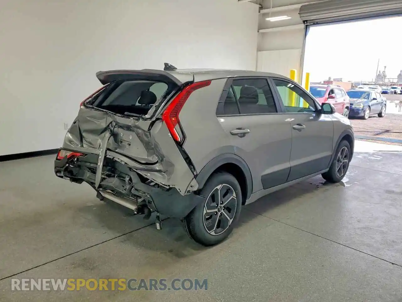 3 Photograph of a damaged car KNDCP3LE9T5363907 KIA NIRO 2026
