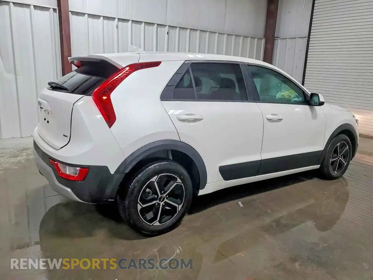 3 Photograph of a damaged car KNDCP3LEXT5340278 KIA NIRO 2026