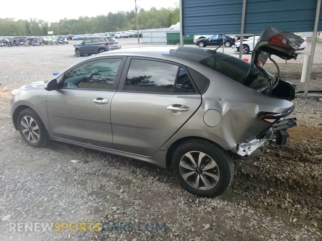 2 fotografías del automóvil dañado 3KPA24AD5NE432542 KIA RIO 2022