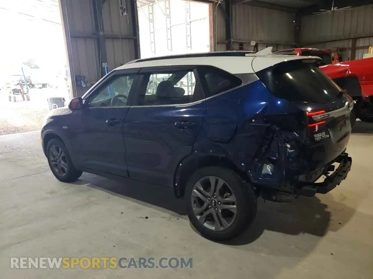 2 Photograph of a damaged car KNDEUCAAXM7058519 KIA SELTOS 2021