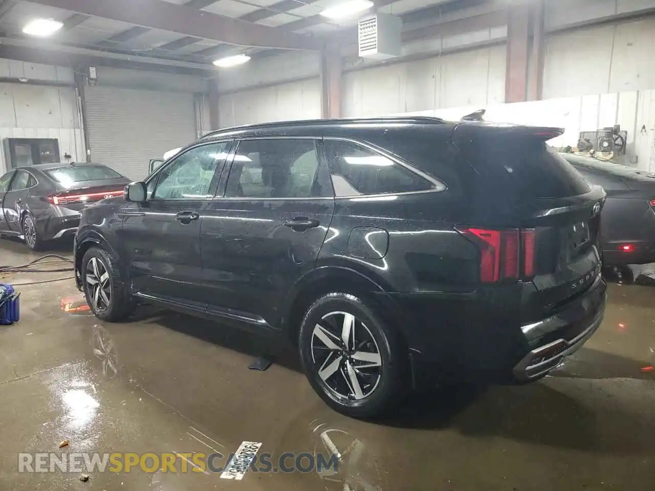 2 fotografías del automóvil dañado 5XYRL4LC6MG021057 KIA SORENTO 2021