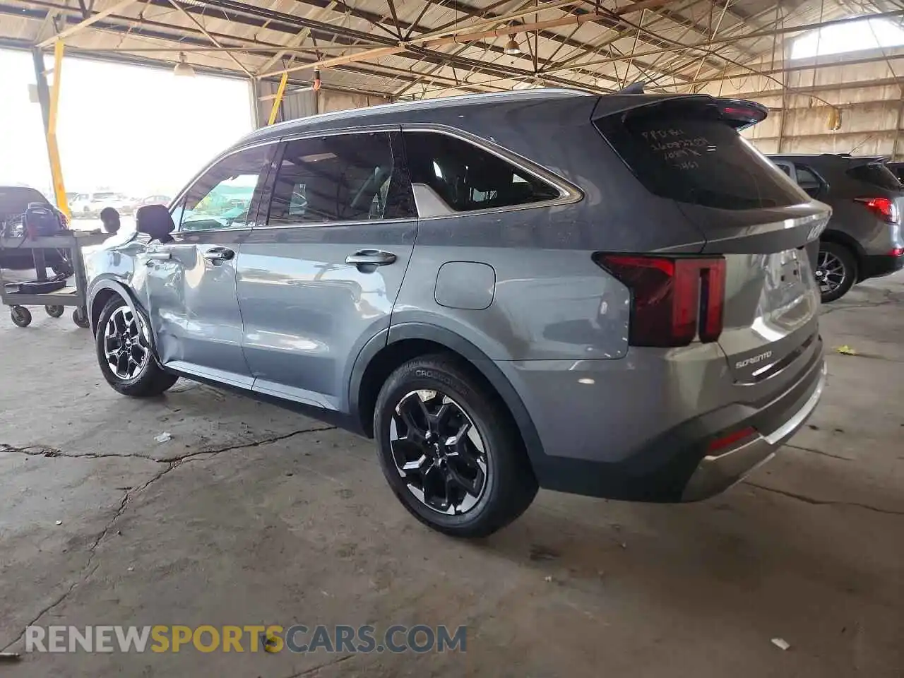 2 fotografías del automóvil dañado 5XYRL4JC2RG287461 KIA SORENTO 2024