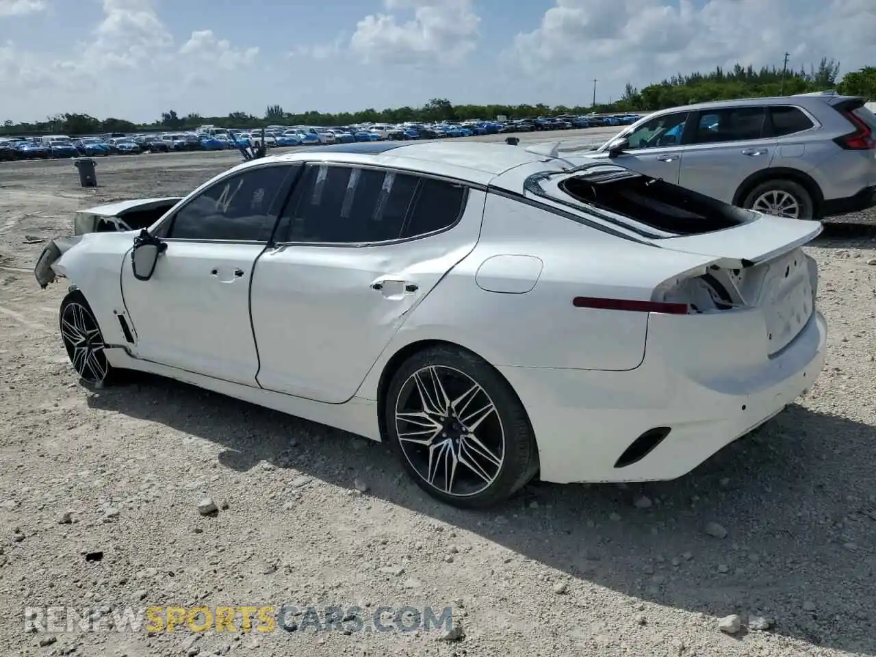 2 Photograph of a damaged car KNAE55LC2P6134667 KIA STINGER 2023