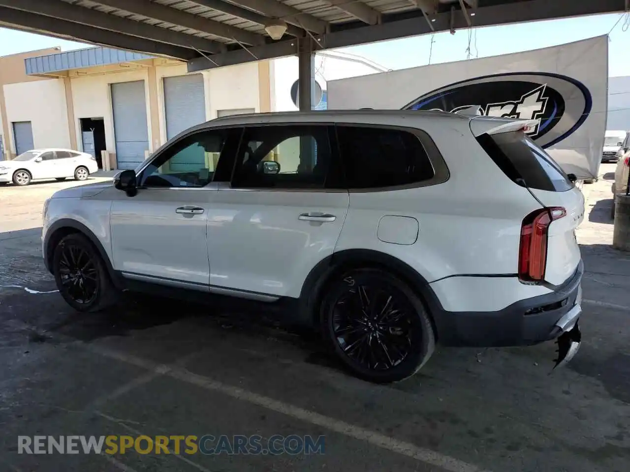 2 fotografías del automóvil dañado 5XYP54HC6MG104000 KIA TELLURIDE 2021
