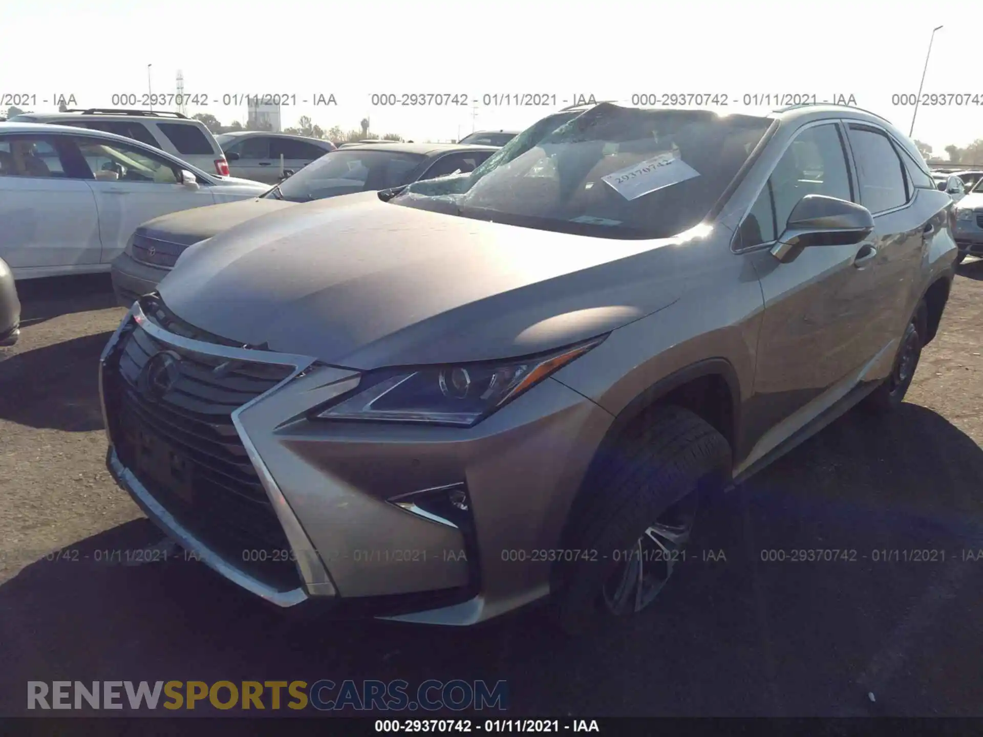 2 Photograph of a damaged car 2T2ZZMCA2KC139463 LEXUS RX 2019