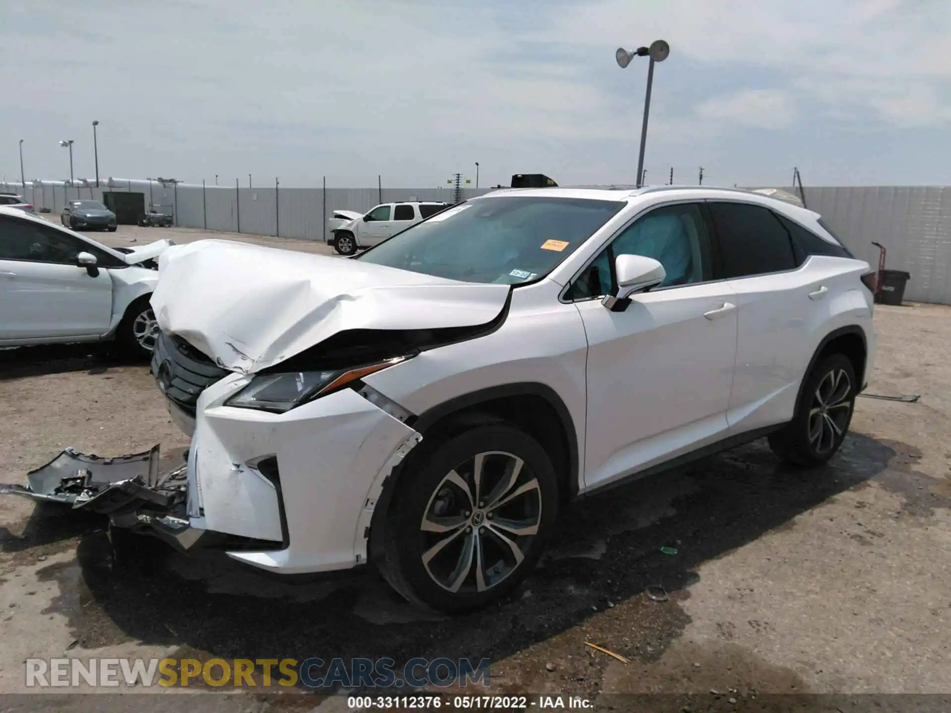 2 Photograph of a damaged car 2T2ZZMCA8KC125163 LEXUS RX 2019