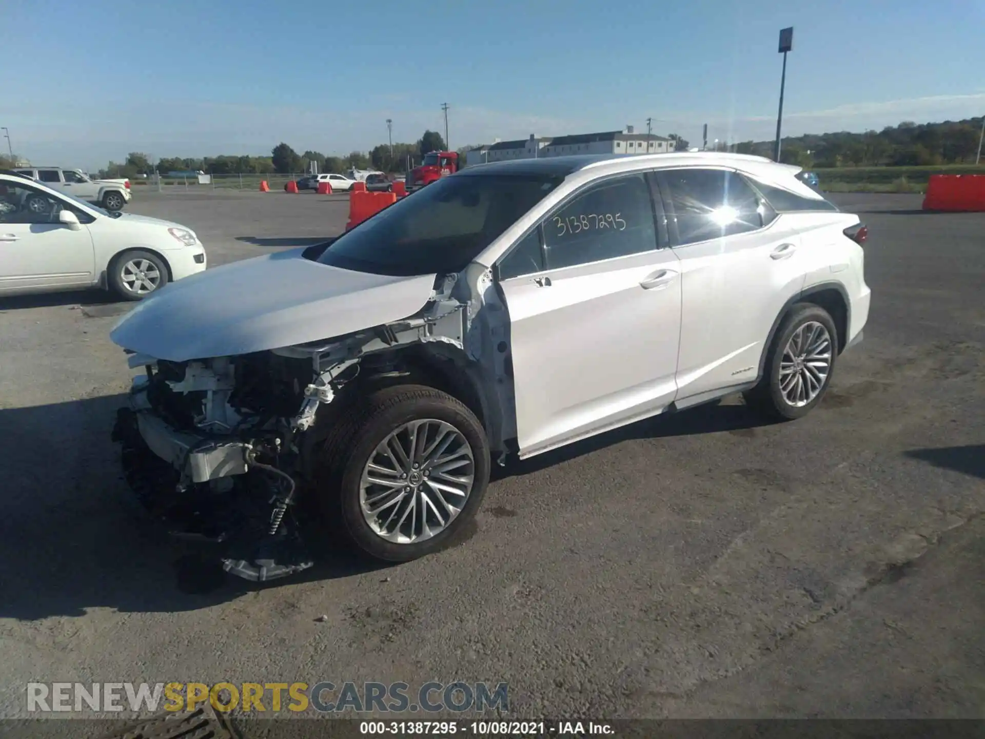 2 Photograph of a damaged car 2T2JGMDA6LC048537 LEXUS RX 2020