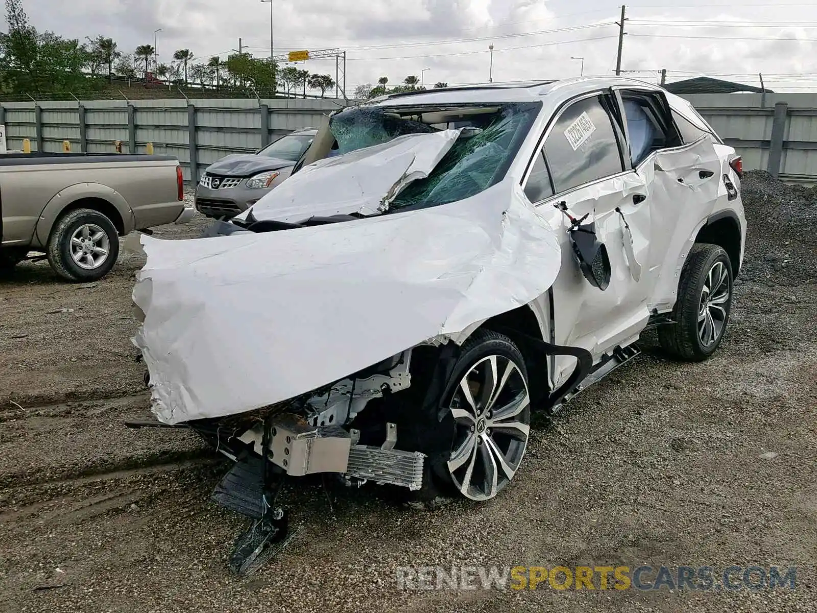 2 Photograph of a damaged car 2T2ZZMCA3KC133560 LEXUS RX 350 2019