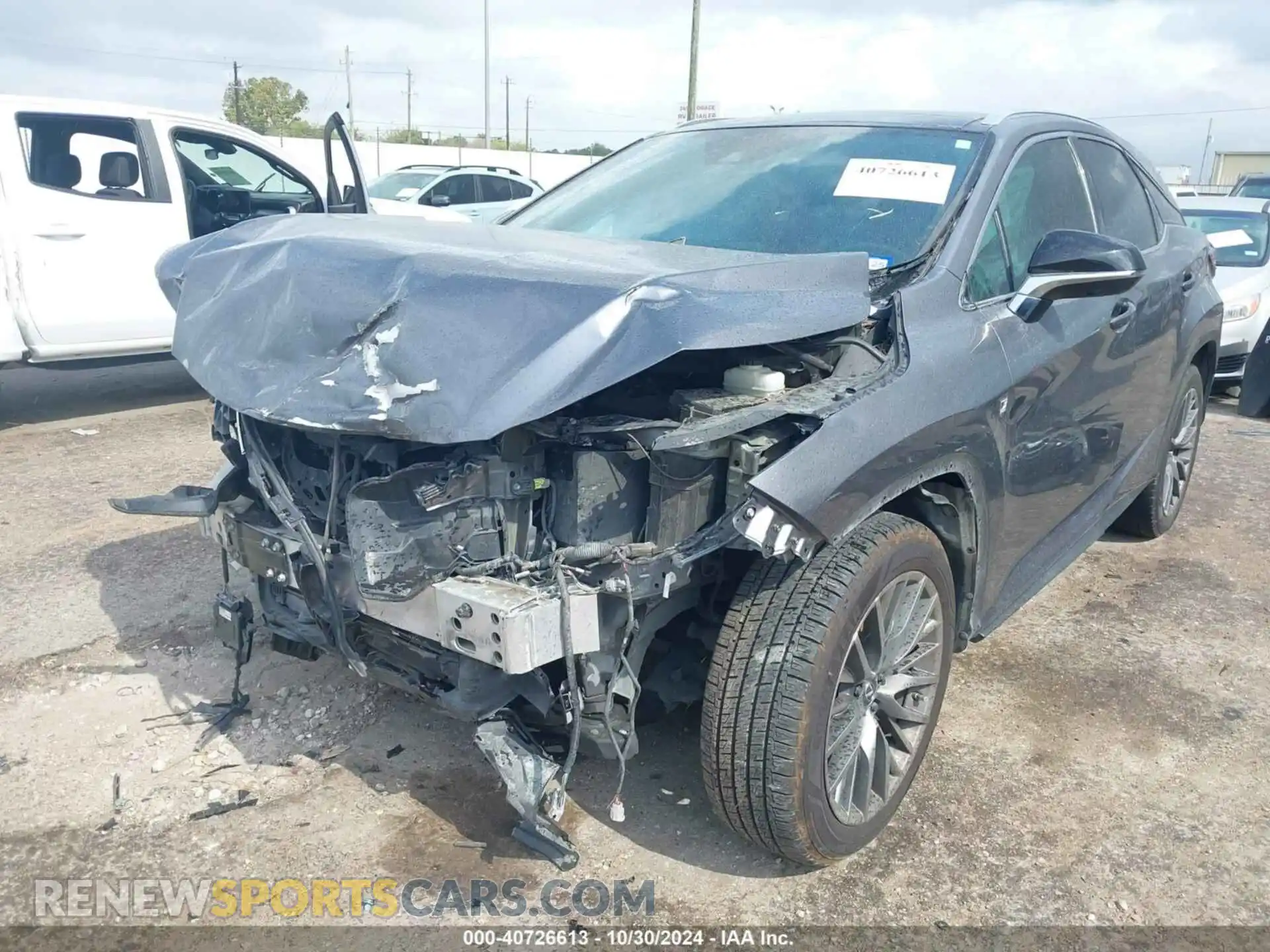 2 Photograph of a damaged car 2T2YZMDA7LC231700 LEXUS RX 350 2020