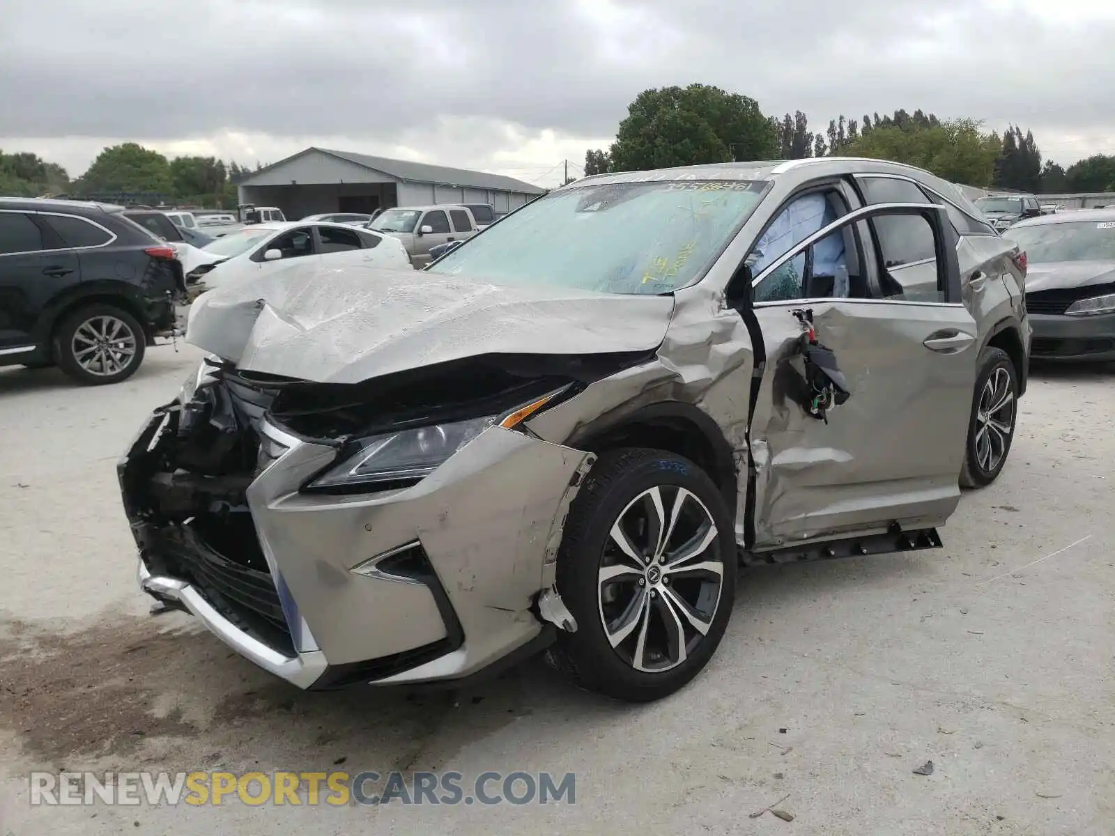 2 Photograph of a damaged car 2T2BZMCA6KC207331 LEXUS RX350 2019