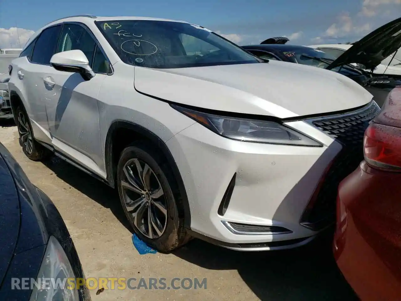 1 Photograph of a damaged car 2T2HZMDA4MC271962 LEXUS RX350 2021