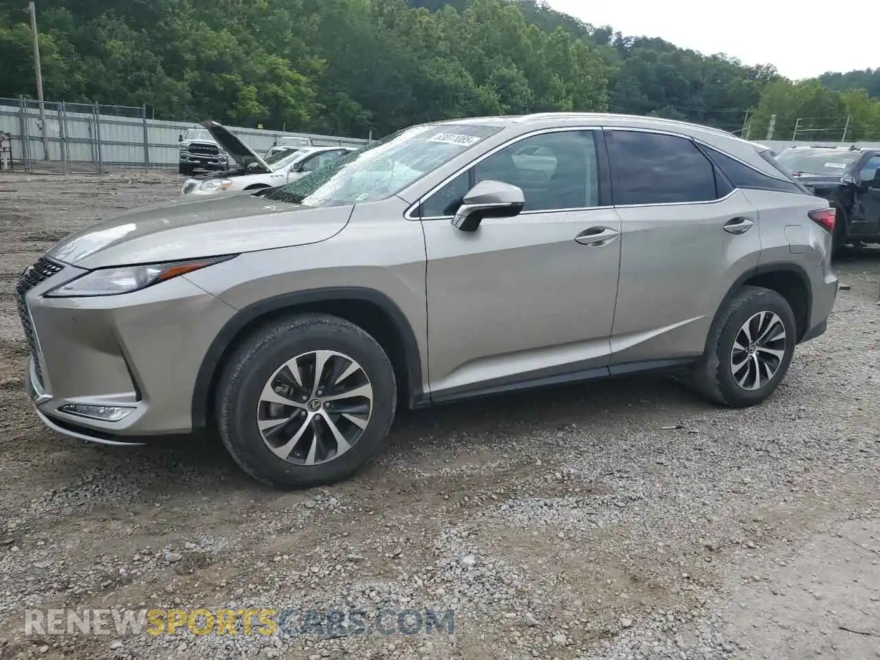 1 Photograph of a damaged car 2T2HZMDA8NC351458 LEXUS RX350 2022