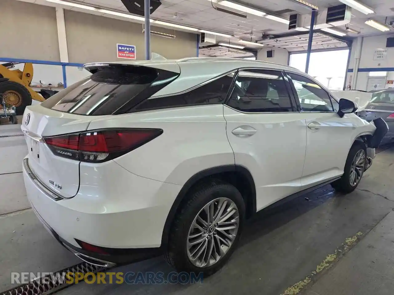 3 Photograph of a damaged car 2T2JZMDA2NC340411 LEXUS RX350 2022