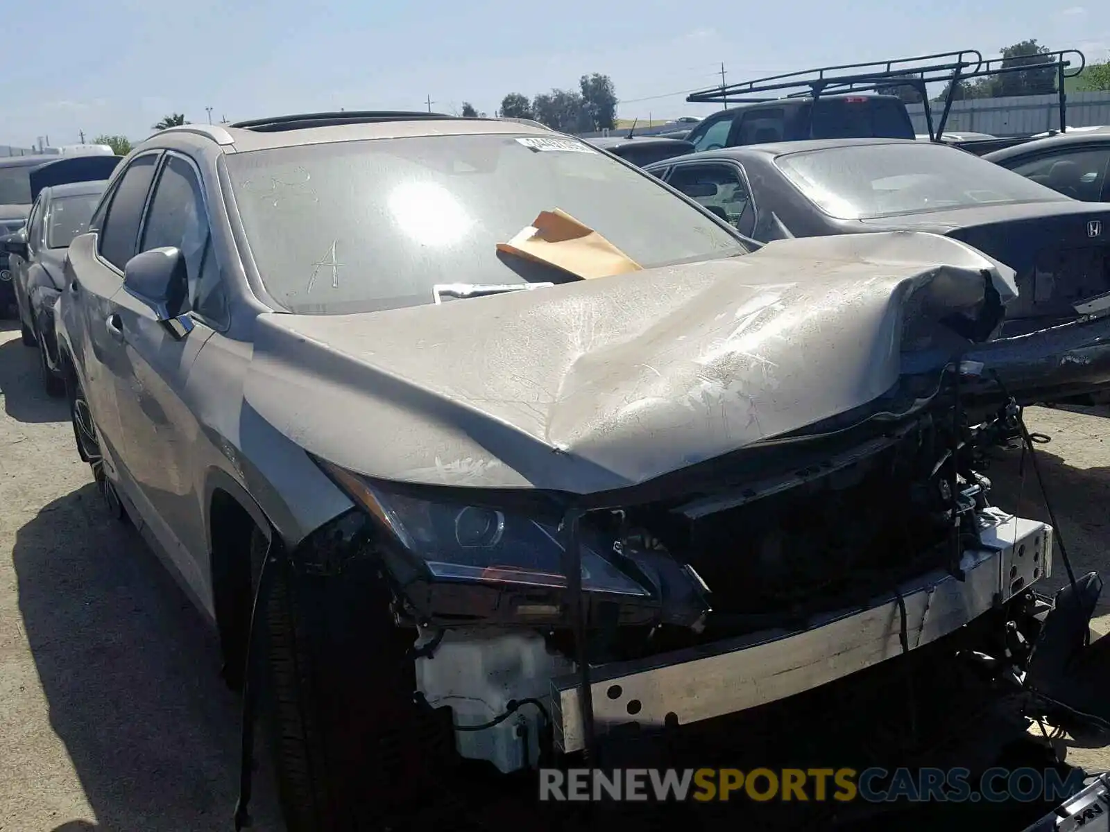 1 Photograph of a damaged car 2T2BGMCAXKC036119 LEXUS RX450 2019