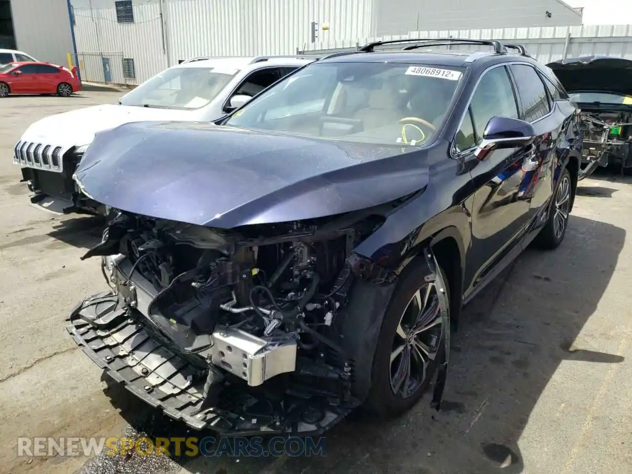 2 fotografías del automóvil dañado 2T2HGMDAXMC068483 LEXUS RX450 2021