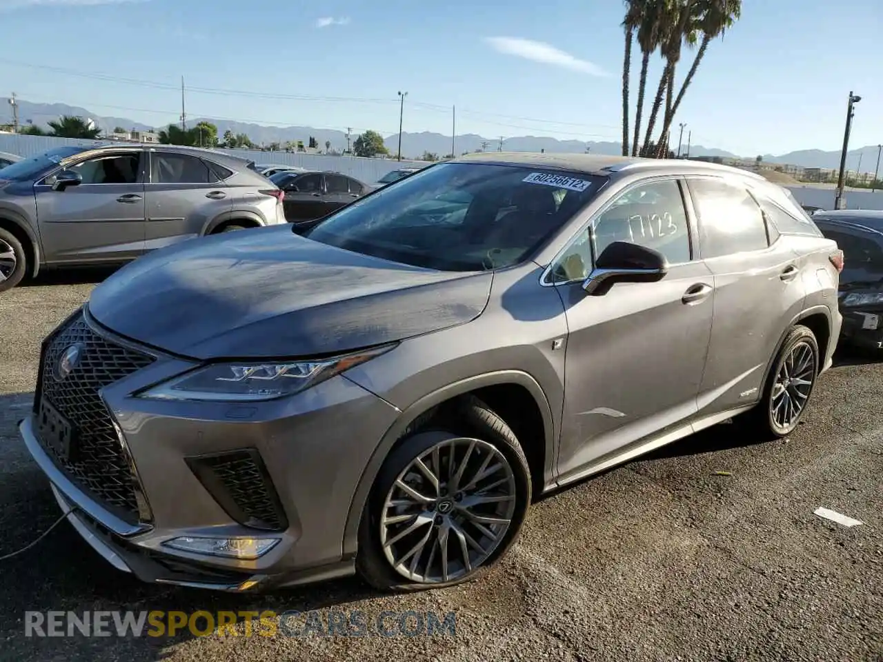 2 fotografías del automóvil dañado 2T2YGMDA4MC070956 LEXUS RX450 2021