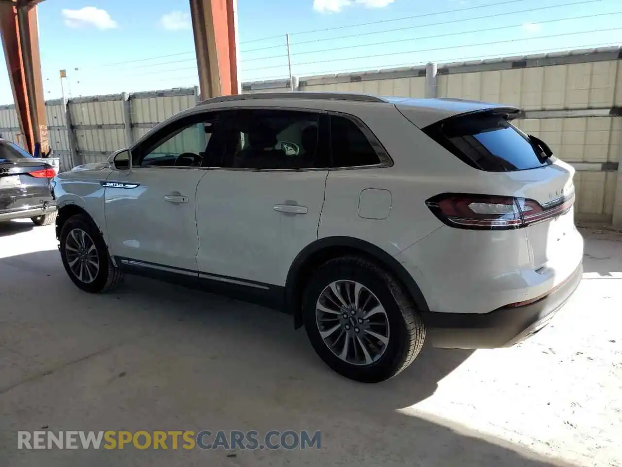2 fotografías del automóvil dañado 2LMPJ6J91NBL08652 LINCOLN NAUTILUS 2022