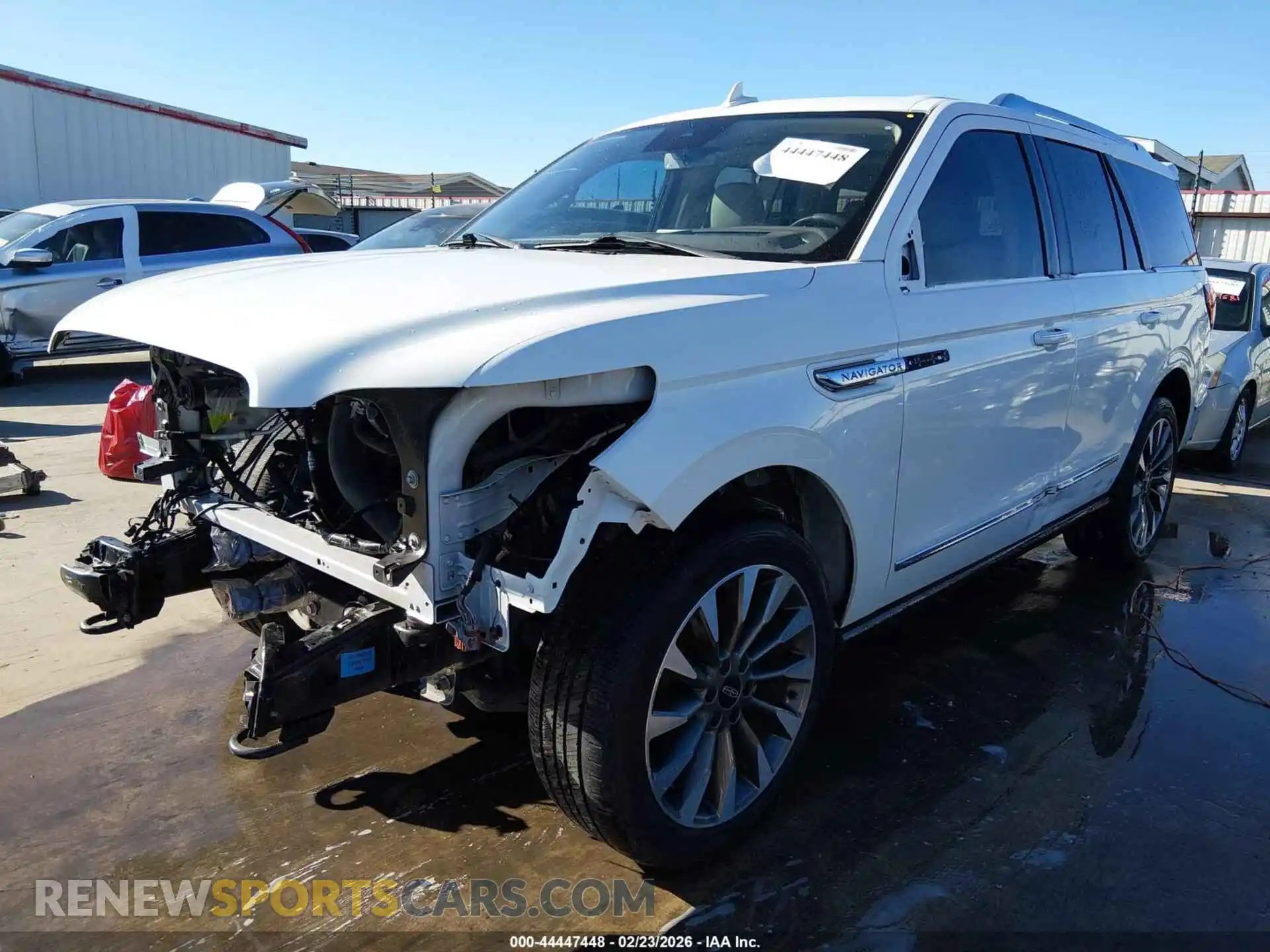 2 fotografías del automóvil dañado 5LMJJ2LT0MEL20441 LINCOLN NAVIGATOR 2021