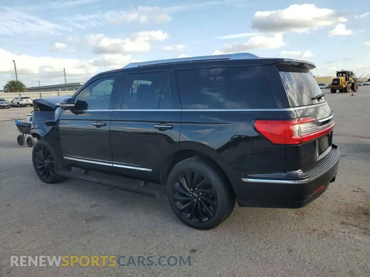 2 fotografías del automóvil dañado 5LMJJ2LT5MEL01433 LINCOLN NAVIGATOR 2021