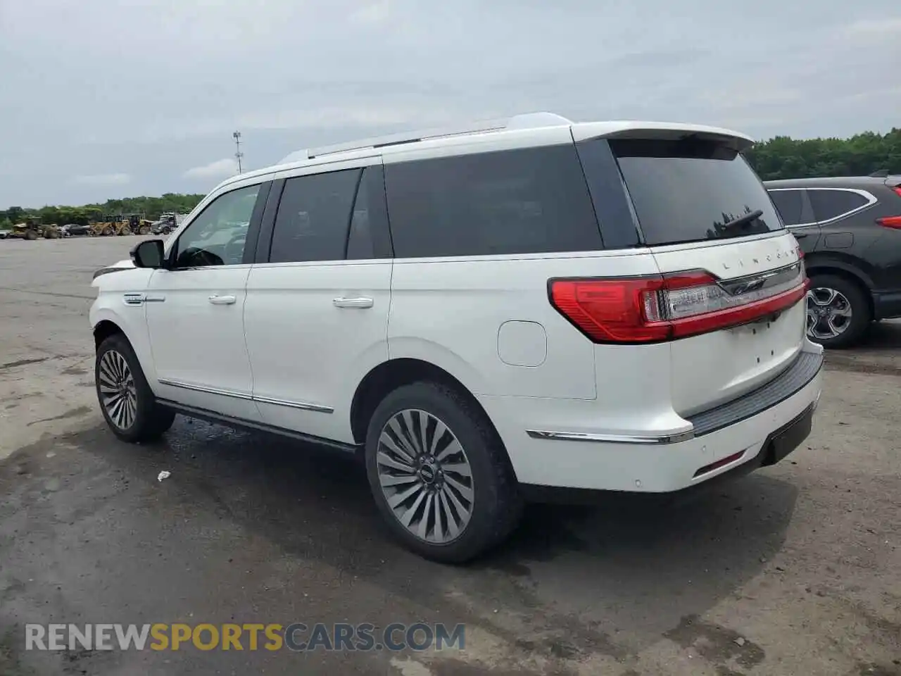 2 fotografías del automóvil dañado 5LMJJ2LT9MEL20308 LINCOLN NAVIGATOR 2021