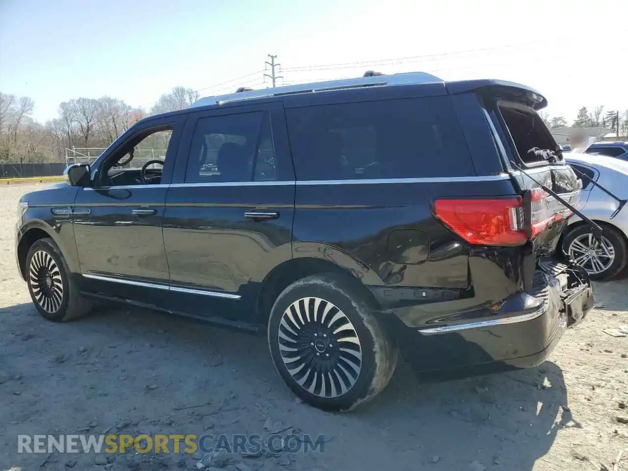 2 fotografías del automóvil dañado 5LMJJ2TT6MEL20329 LINCOLN NAVIGATOR 2021