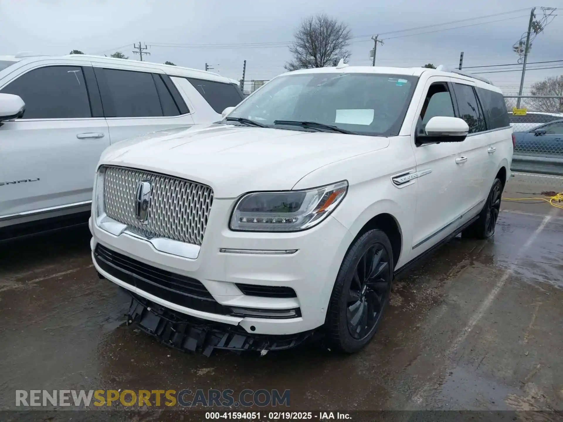 2 fotografías del automóvil dañado 5LMJJ3LTXMEL07282 LINCOLN NAVIGATOR 2021