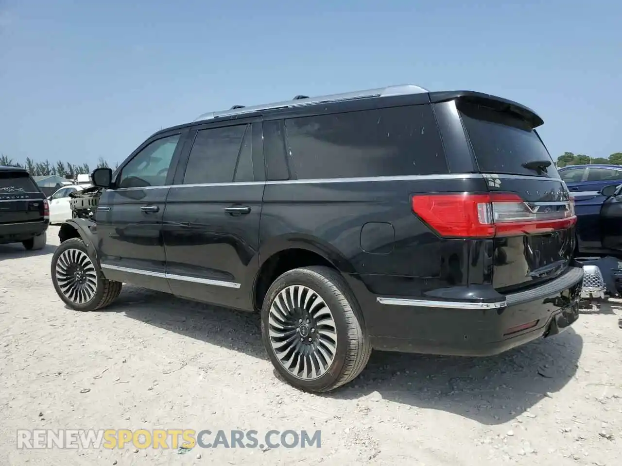 2 fotografías del automóvil dañado 5LMJJ3TT9MEL00758 LINCOLN NAVIGATOR 2021