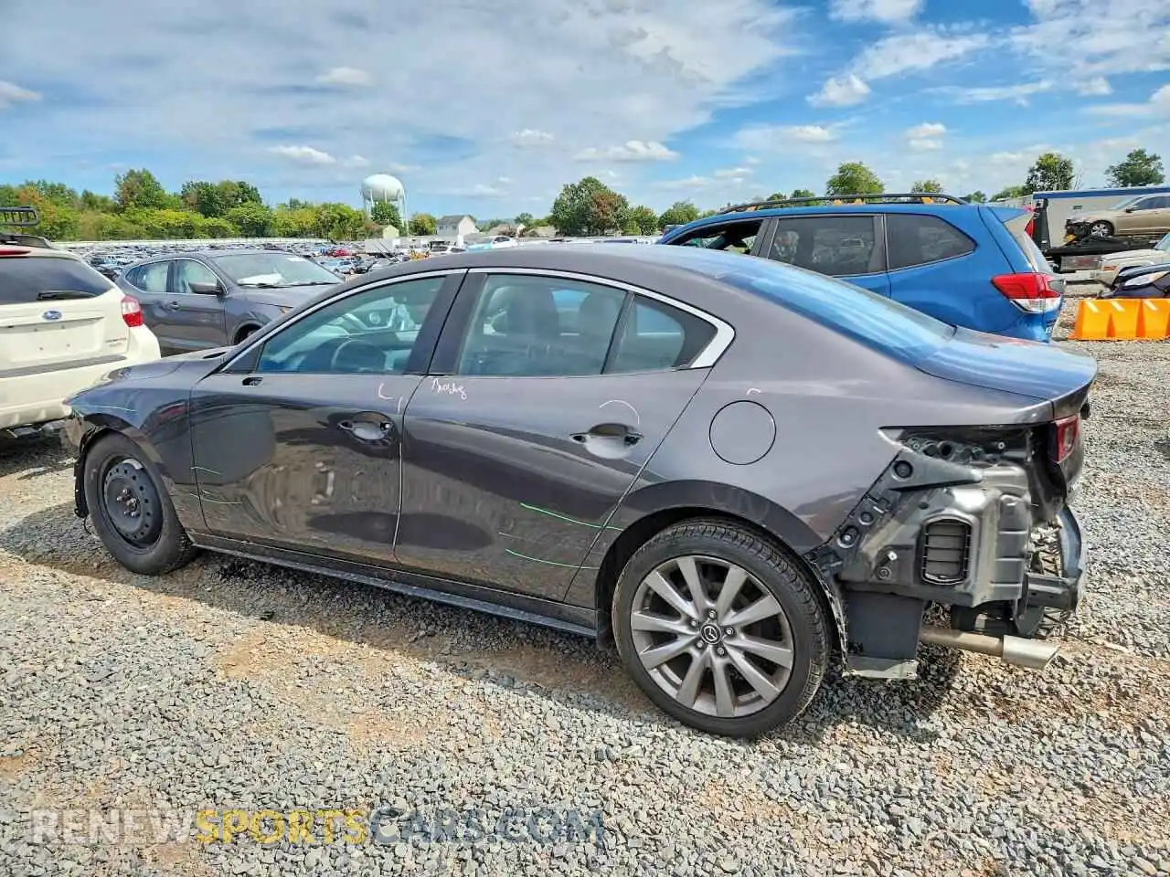 2 fotografías del automóvil dañado 3MZBPACLXMM251723 MAZDA 3 2021