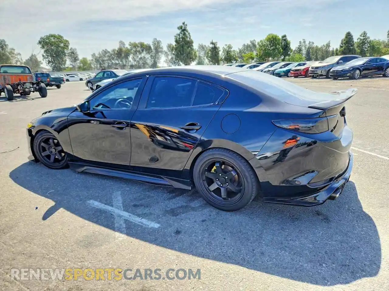 2 fotografías del automóvil dañado JM1BPAALXM1320591 MAZDA 3 2021