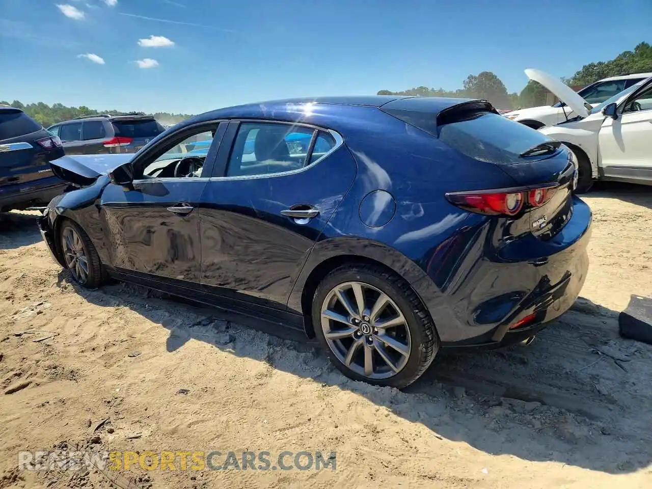 2 fotografías del automóvil dañado JM1BPBKL4M1315763 MAZDA 3 2021