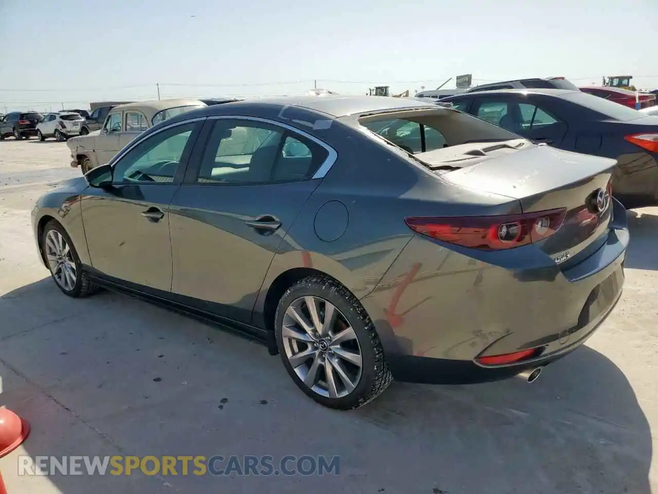 2 Photograph of a damaged car 3MZBPABL4NM313703 MAZDA 3 2022