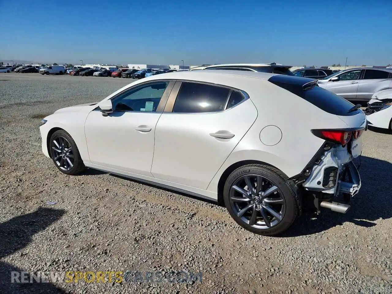 2 fotografías del automóvil dañado JM1BPALL0N1522323 MAZDA 3 2022