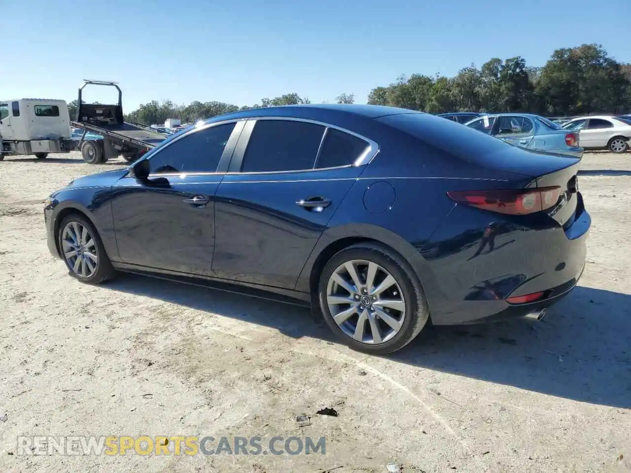 2 fotografías del automóvil dañado 3MZBPABM2PM372034 MAZDA 3 2023