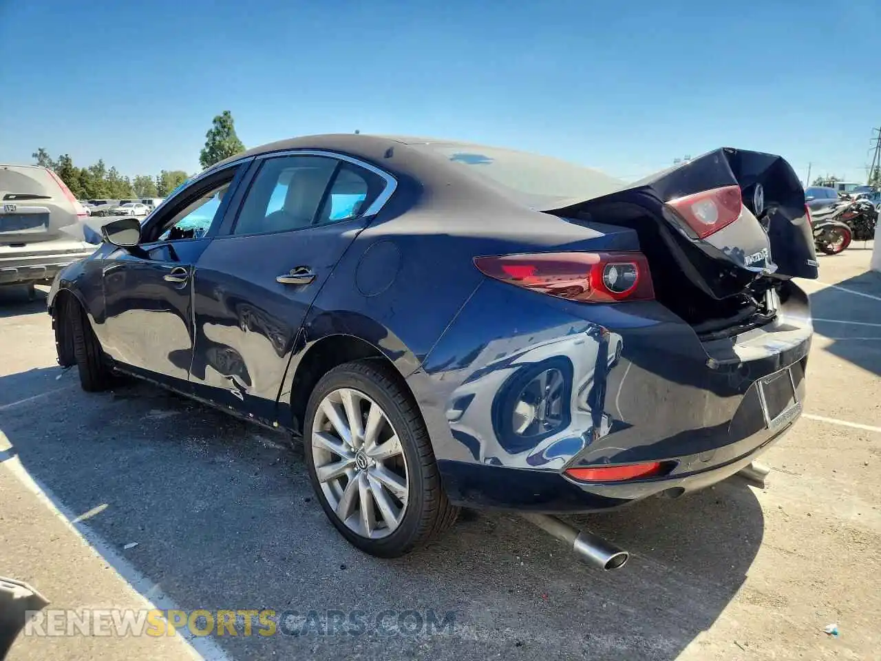 2 fotografías del automóvil dañado 3MZBPACM1PM354428 MAZDA 3 2023