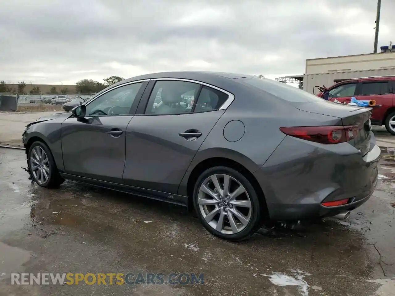 2 fotografías del automóvil dañado 3MZBPACM7PM376417 MAZDA 3 2023