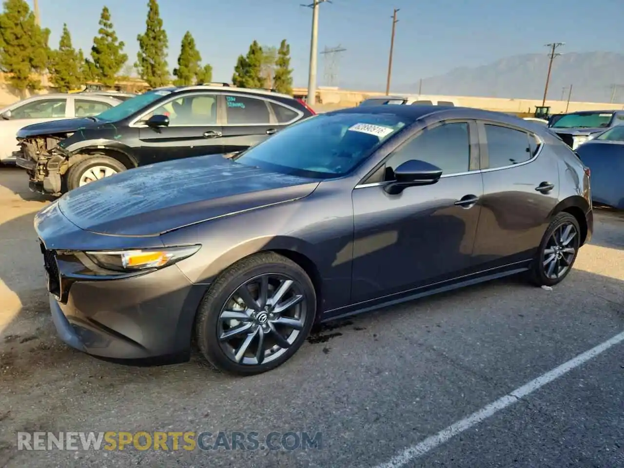 1 Photograph of a damaged car JM1BPAKM5P1614623 MAZDA 3 2023