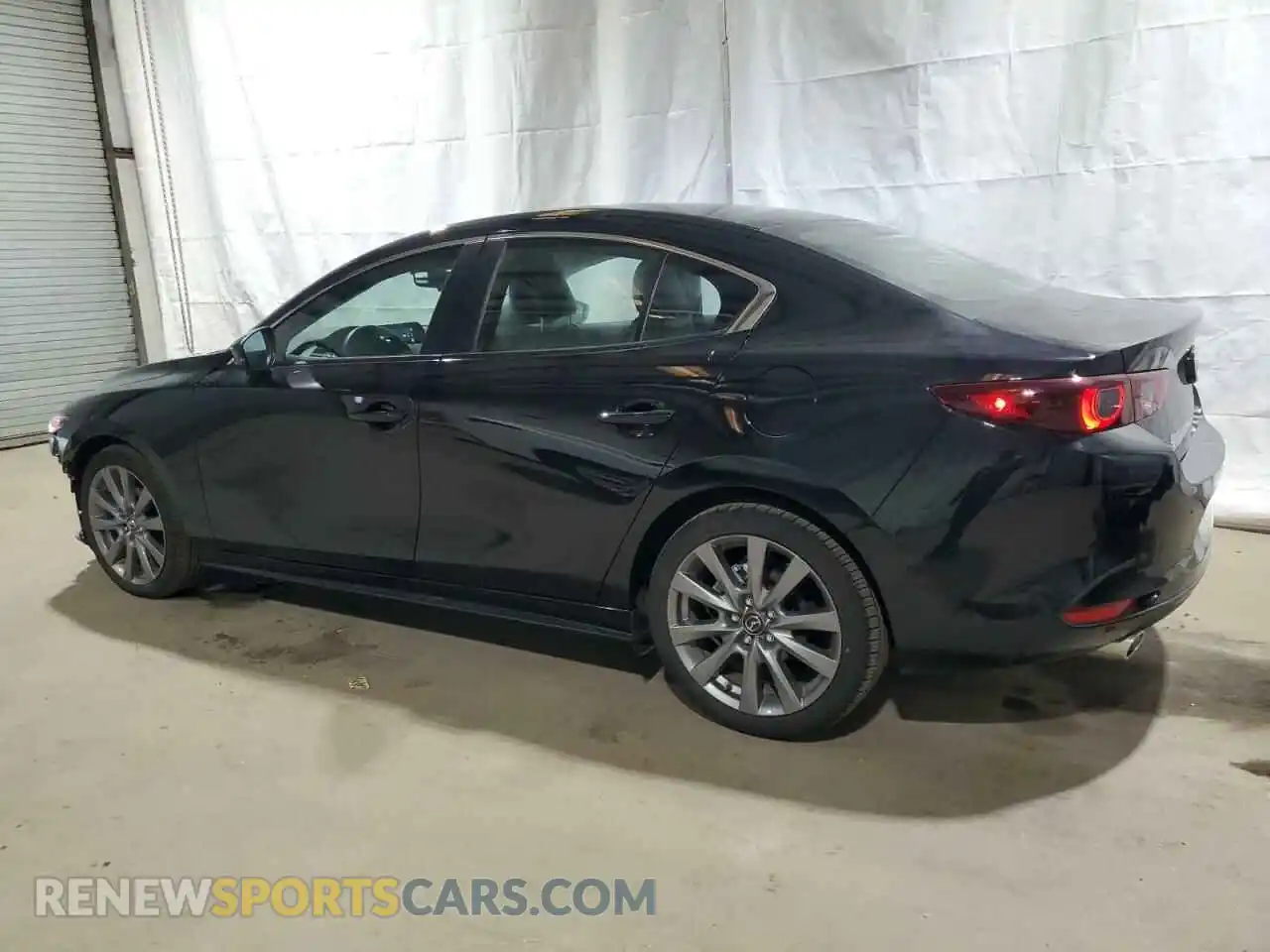2 Photograph of a damaged car 3MZBPACM1RM413030 MAZDA 3 2024