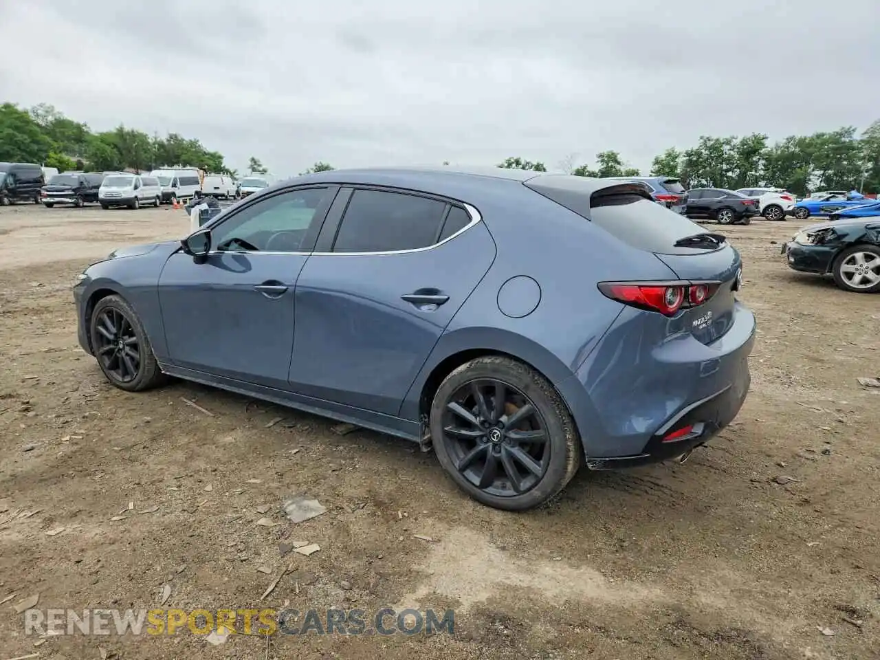 2 fotografías del automóvil dañado JM1BPBLM7R1701429 MAZDA 3 2024