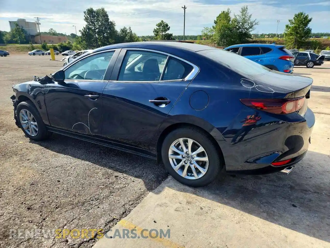 2 fotografías del automóvil dañado JM1BPAAL3T1870052 MAZDA 3 2026