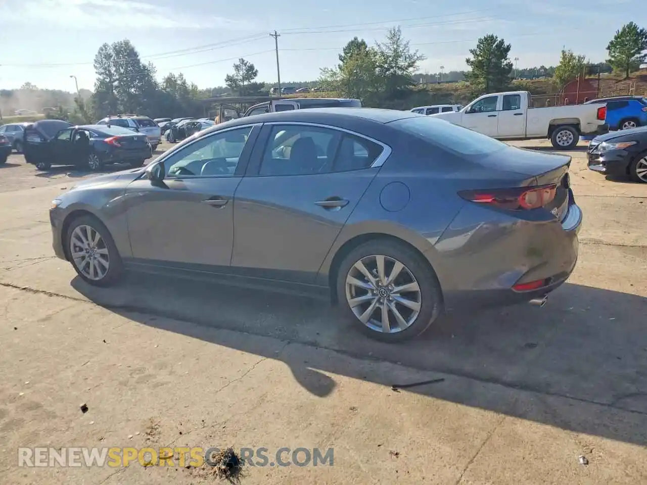 2 fotografías del automóvil dañado JM1BPACL6T1870012 MAZDA 3 2026